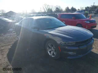 2016 Dodge Charger SXT with VIN 2C3CDXHG3GH357176, listed as a IAAI auction lot 41973540 with 69,240 mi miles. Bid and sale history available at carsss.com. Image 1.