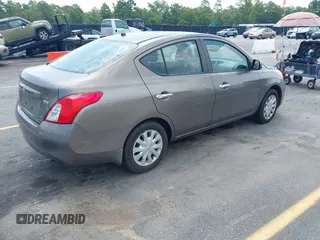 2012 Nissan Versa SV with VIN 3N1CN7AP6CL885513, listed as a IAAI auction lot 42681213 with 282,203 mi miles and . Bid and sale history available at DreamBid. Image 4.