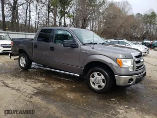 2013 Ford F-150 XL with VIN 1FTFW1CF6DKE99055, listed as a Copart auction lot 47014585 with 169,115 mi miles and Salvage Title. Bid and sale history available at carsss.com. Image 4.