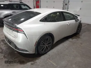 2024 Toyota Prius LE with VIN JTDADABUXR3017902, listed as a IAAI auction lot 41160409 with 4,387 mi miles. Bid and sale history available at carsss.com. Image 4.