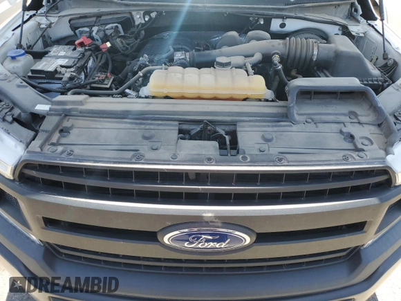 2018 Ford F-150 XL z VIN 1FTEX1CB0JKF29765, wystawiony jako Copart lot #63671145 z przebiegiem 106 036 mil mil oraz Czysty tytuł • Clean title. Historia ofert i sprzedaży dostępna na DreamBid. Obrazek 11.