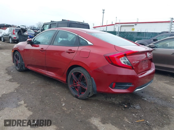 2020 Honda Civic LX with VIN 2HGFC2F69LH541980, listed as a IAAI auction lot 41981609 with 75,458 mi miles and . Bid and sale history available at DreamBid. Image 3.