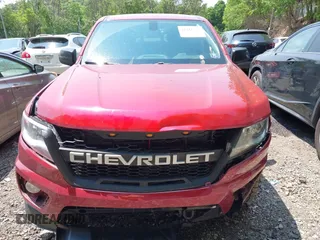 2018 Chevrolet Colorado 4WD LT z VIN 1GCGTCENXJ1214811, wystawiony jako IAAI lot #42418878 z przebiegiem 80 453 mil mil oraz . Historia ofert i sprzedaży dostępna na DreamBid. Obrazek 12.