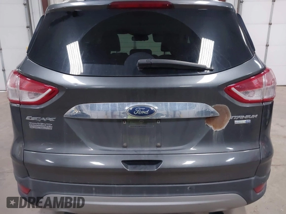 2016 Ford Escape Titanium with VIN 1FMCU9J90GUB35593, listed as a IAAI auction lot 42309020 with 173,019 mi miles and . Bid and sale history available at DreamBid. Image 16.
