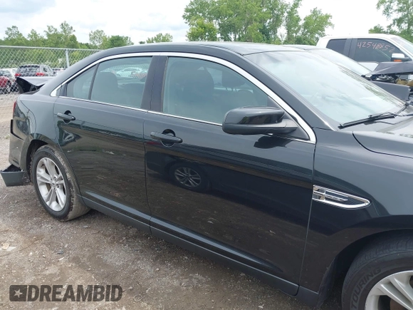 2015 Ford Taurus SEL with VIN 1FAHP2E80FG192017, listed as a IAAI auction lot 42562853 with 124,348 mi miles and . Bid and sale history available at DreamBid. Image 13.