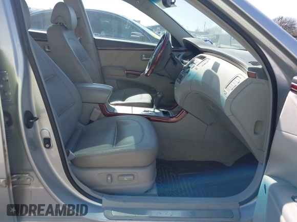 2006 Hyundai Azera SE with VIN KMHFC46FX6A107141, listed as a IAAI auction lot 41793111 with 124,137 mi miles and . Bid and sale history available at DreamBid. Image 5.