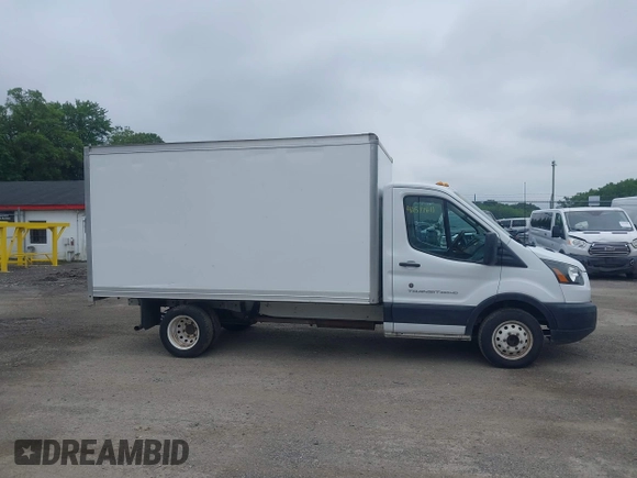 2019 Ford Transit with VIN 1FDBF8ZM0KKA89793, listed as a IAAI auction lot 42577611 with 71,148 mi miles and . Bid and sale history available at DreamBid. Image 12.