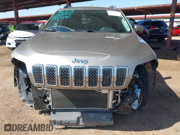 2021 Jeep Cherokee Altitude with VIN 1C4PJLLBXMD155096, listed as a IAAI auction lot 41746319 with 99,423 mi miles and . Bid and sale history available at DreamBid. Image 6.