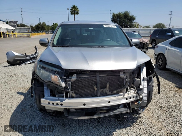 2019 Honda Ridgeline RTL with VIN 5FPYK2F55KB003581, listed as a Copart auction lot 61231815 with 77,166 mi miles and Salvage title. Bid and sale history available at DreamBid. Image 5.