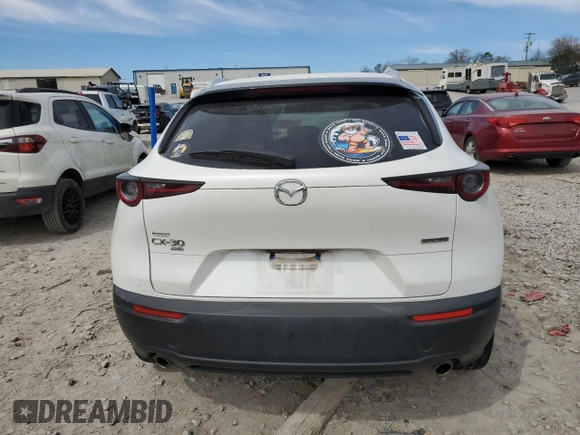 2022 Mazda CX-30 S Carbon Edition с VIN 3MVDMBCL9NM404733, выставлен на аукционе Copart как лот 48546265 с пробегом 39 436 миль миль и Списание • Salvage title. История ставок и продаж доступна на DreamBid. Изображение 6.