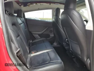 2023 Tesla Model Y Performance z VIN 7SAYGDEF2PF591238, wystawiony jako Copart lot #51991025 z przebiegiem 44 749 mil mil oraz Szkoda całkowita • Salvage title. Historia ofert i sprzedaży dostępna na DreamBid. Obrazek 10.
