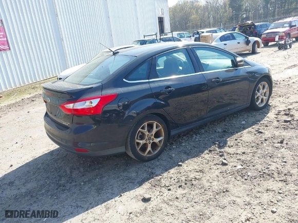 2014 Ford Focus Titanium with VIN 1FADP3J27EL227311, listed as a IAAI auction lot 41904675 with 180,459 mi miles. Bid and sale history available at carsss.com. Image 4.