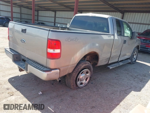 2005 Ford F-150 XLT with VIN 1FTPX14525NA78019, listed as a IAAI auction lot 41932381 with 170,153 mi miles. Bid and sale history available at carsss.com. Image 4.