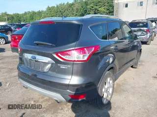 2016 Ford Escape Titanium with VIN 1FMCU9J99GUB27573, listed as a IAAI auction lot 42445457 with 156,784 mi miles and . Bid and sale history available at DreamBid. Image 4.