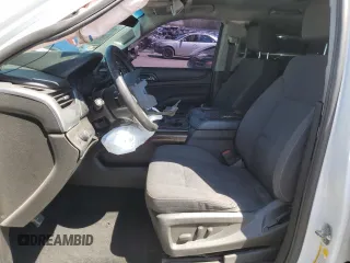 2018 Chevrolet Tahoe LS with VIN 1GNSCAKC0JR296669, listed as a Copart auction lot 54044745 with 147,457 mi miles and Salvage title. Bid and sale history available at DreamBid. Image 7.