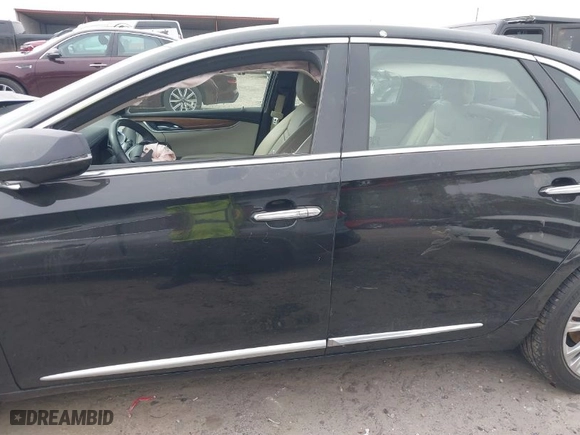 2019 Cadillac XTS Luxury with VIN 2G61M5S38K9152522, listed as a IAAI auction lot 41670026 with NaN miles. Bid and sale history available at carsss.com. Image 14.