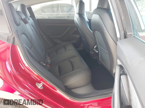 2020 Tesla Model 3 Standard Range Plus z VIN 5YJ3E1EA7LF611669, wystawiony jako IAAI lot #42179974 z przebiegiem 17 696 mil mil oraz . Historia ofert i sprzedaży dostępna na DreamBid. Obrazek 8.
