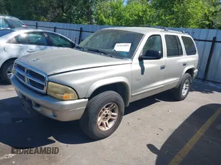2001 Dodge Durango z VIN 1B4HS28N21F628307, wystawiony jako IAAI lot #42413604 z przebiegiem 250 098 mil mil oraz . Historia ofert i sprzedaży dostępna na DreamBid. Obrazek 2.