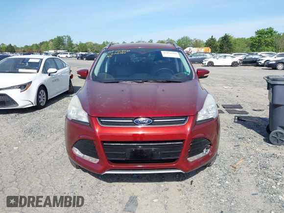 2016 Ford Escape Titanium with VIN 1FMCU9JX9GUA16892, listed as a IAAI auction lot 42110986 with 87,775 mi miles and . Bid and sale history available at DreamBid. Image 12.