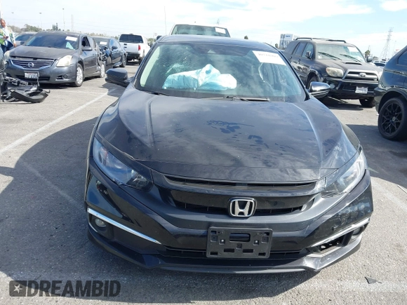 2021 Honda Civic Sedan EX-L with VIN 19XFC1F7XME202885, listed as a IAAI auction lot 40718909 with 42,331 mi miles. Bid and sale history available at carsss.com. Image 12.