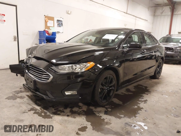 2019 Ford Fusion SE with VIN 3FA6P0HD5KR284103, listed as a IAAI auction lot 41477133 with 90,722 mi miles and . Bid and sale history available at carsss.com. Image 17.
