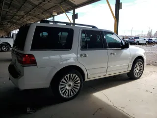 2015 Lincoln Navigator z VIN 5LMJJ2HT1FEJ07011, wystawiony jako Copart lot #59206875 z przebiegiem 251 474 mil mil oraz Czysty tytuł • Clean title. Historia ofert i sprzedaży dostępna na DreamBid. Obrazek 3.