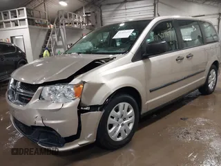 2015 Dodge Grand Caravan SE with VIN 2C4RDGBG2FR592899, listed as a IAAI auction lot 41309499 with 110,428 mi miles and . Bid and sale history available at DreamBid. Image 2.