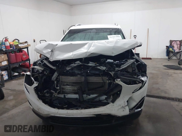 2018 GMC Terrain SLT with VIN 3GKALVEX1JL303327, listed as a IAAI auction lot 41347394 with 106,859 mi miles and . Bid and sale history available at DreamBid. Image 12.