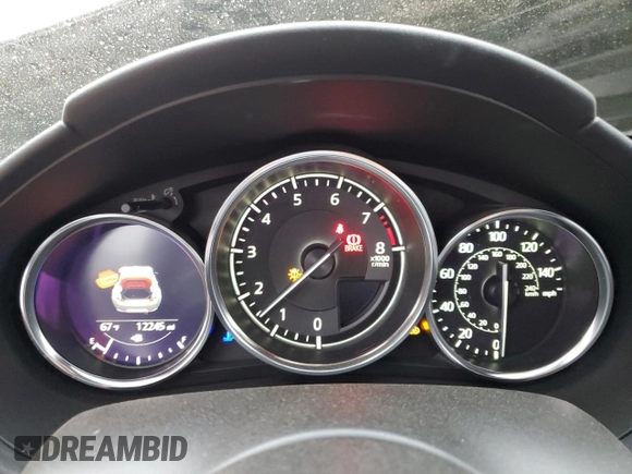2022 Mazda MX-5 Miata Grand Touring z VIN JM1NDAM77N0501546, wystawiony jako Copart lot #82161264 z przebiegiem 12 245 mil mil oraz Szkoda całkowita • Salvage title. Historia ofert i sprzedaży dostępna na DreamBid. Obrazek 9.