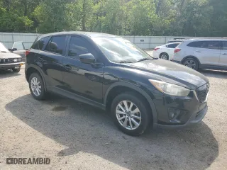 2014 Mazda CX-5 Touring with VIN JM3KE2CY7E0427312, listed as a Copart auction lot 52869335 with 192,903 mi miles and Salvage Title. Bid and sale history available at carsss.com. Image 4.
