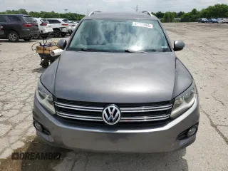 2012 Volkswagen Tiguan SE z VIN WVGAV7AX4CW001417, wystawiony jako Copart lot #61105865 z przebiegiem 168 110 mil mil oraz Czysty tytuł • Clean title. Historia ofert i sprzedaży dostępna na DreamBid. Obrazek 5.