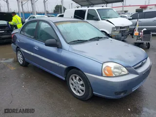 2003 Kia Rio with VIN KNADC125736223027, listed as a IAAI auction lot 41797538 with 25,611 mi miles. Bid and sale history available at carsss.com. Image 1.
