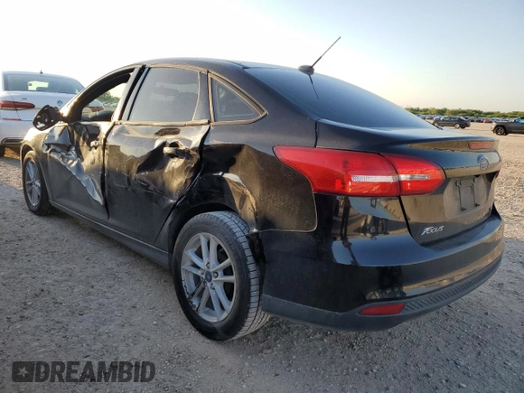 2017 Ford Focus SE with VIN 1FADP3F25HL219608, listed as a Copart auction lot 56559925 with 100,207 mi miles and Salvage title. Bid and sale history available at DreamBid. Image 2.
