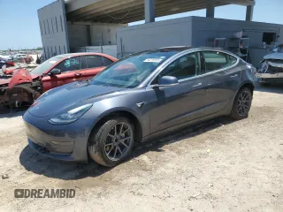 2018 Tesla Model 3 Long Range Battery with VIN 5YJ3E1EA9JF044636, listed as a Copart auction lot 54218955 with 66,126 mi miles and Salvage Title. Bid and sale history available at DreamBid. Image 1.