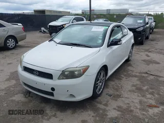 2005 Scion tC with VIN JTKDE177750015400, listed as a IAAI auction lot 39040511 with 232,749 mi miles. Bid and sale history available at carsss.com. Image 18.