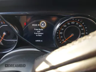 2021 Jeep Wrangler Unlimited Sport Altitude with VIN 1C4HJXDGXMW662493, listed as a IAAI auction lot 41288957 with 64,808 mi miles and . Bid and sale history available at DreamBid. Image 7.