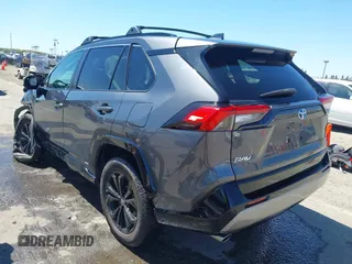 2022 Toyota RAV4 Hybrid SE with VIN 4T3T6RFV1NU068121, listed as a IAAI auction lot 42304467 with Not provided miles and . Bid and sale history available at DreamBid. Image 3.