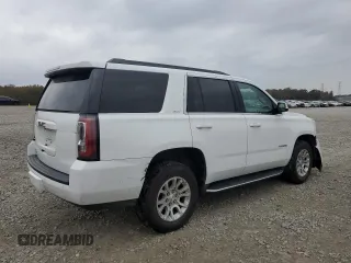 2020 GMC Yukon SLT with VIN 1GKS1BKC3LR168874, listed as a Copart auction lot 82103464 with 79,220 mi miles and Salvage Title. Bid and sale history available at DreamBid. Image 3.