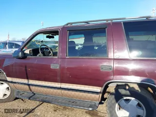1996 Chevrolet Tahoe with VIN 1GNEK13R9TJ336722, listed as a IAAI auction lot 41576273 with 163,609 mi miles. Bid and sale history available at carsss.com. Image 15.