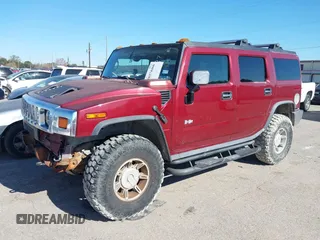 2003 Hummer H2 with VIN 5GRGN23U33H115187, listed as a IAAI auction lot 38374466 with 153,158 mi miles. Bid and sale history available at carsss.com. Image 2.