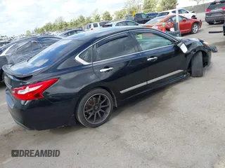 2016 Nissan Altima SR with VIN 1N4AL3AP2GC142213, listed as a IAAI auction lot 41946863 with 100,858 mi miles and . Bid and sale history available at carsss.com. Image 4.
