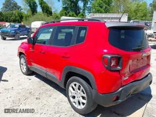 2015 Jeep Renegade Latitude with VIN ZACCJABT0FPB56259, listed as a IAAI auction lot 42050244 with 154,798 mi miles. Bid and sale history available at carsss.com. Image 3.