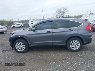 2015 Honda CR-V EX with VIN 2HKRM4H55FH695025, listed as a IAAI auction lot 41963437 with 130,891 mi miles and . Bid and sale history available at DreamBid. Image 14.