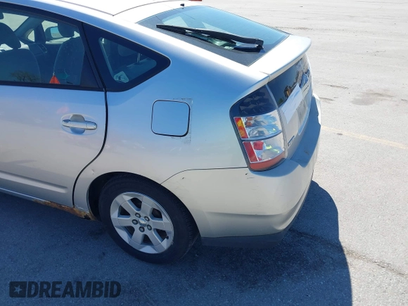 2005 Toyota Prius with VIN JTDKB20U257006883, listed as a IAAI auction lot 42180581 with 187,531 mi miles and . Bid and sale history available at DreamBid. Image 13.
