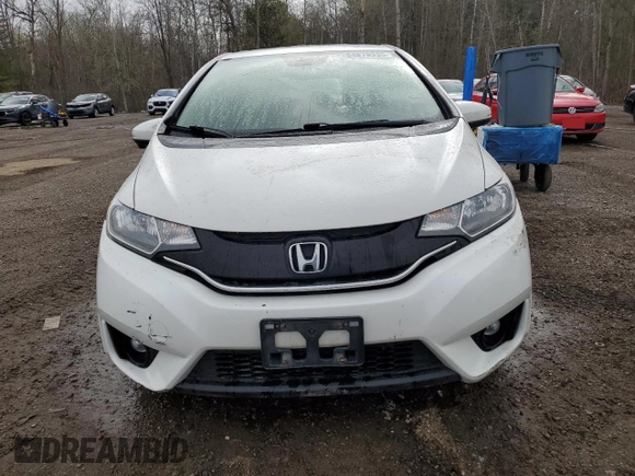 2015 Honda Fit EX-L z VIN 3HGGK5H84FM107978, wystawiony jako Copart lot #54879335 z przebiegiem 193 583 mil mil oraz Nie do naprawy • Non repairable. Historia ofert i sprzedaży dostępna na DreamBid. Obrazek 5.