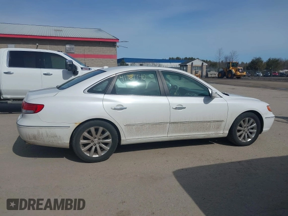 2009 Hyundai Azera Limited z VIN KMHFC46F99A368183, wystawiony jako IAAI lot #41769940 z przebiegiem 144 339 mil mil oraz . Historia ofert i sprzedaży dostępna na DreamBid. Obrazek 14.