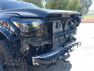2024 Toyota Tacoma 4WD SR5 with VIN 3TMLB5JN4RM039036, listed as a IAAI auction lot 41813562 with 2,112 mi miles. Bid and sale history available at carsss.com. Image 18.