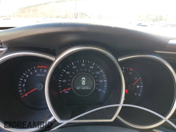 2014 Kia Optima LX z VIN KNAGM4A73E5458757, wystawiony jako Copart lot #53807505 z przebiegiem 144 782 mil mil oraz Szkoda całkowita • Salvage title. Historia ofert i sprzedaży dostępna na DreamBid. Obrazek 9.