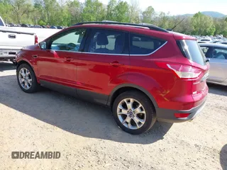 2013 Ford Escape SEL with VIN 1FMCU9H91DUD65144, listed as a IAAI auction lot 42124589 with 221,631 mi miles and . Bid and sale history available at DreamBid. Image 3.