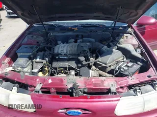 1993 Ford Taurus z VIN 1FACP52U4PG225521, wystawiony jako IAAI lot #42096535 z przebiegiem 76 808 mil mil oraz . Historia ofert i sprzedaży dostępna na DreamBid. Obrazek 10.